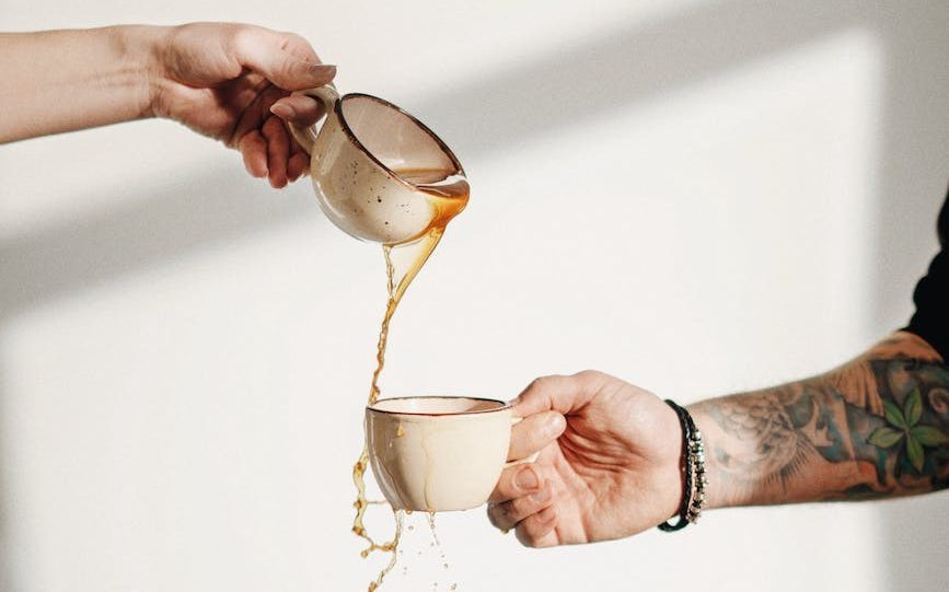 pouring coffee in cup